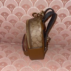 Mini Court Backpack Bag Charm In Signature Canvas.   New condition ,